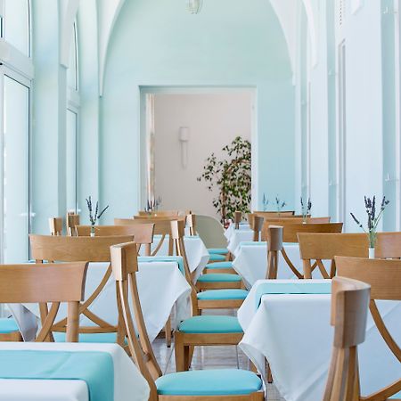 Atlantis Hotel Тира Ресторан фото